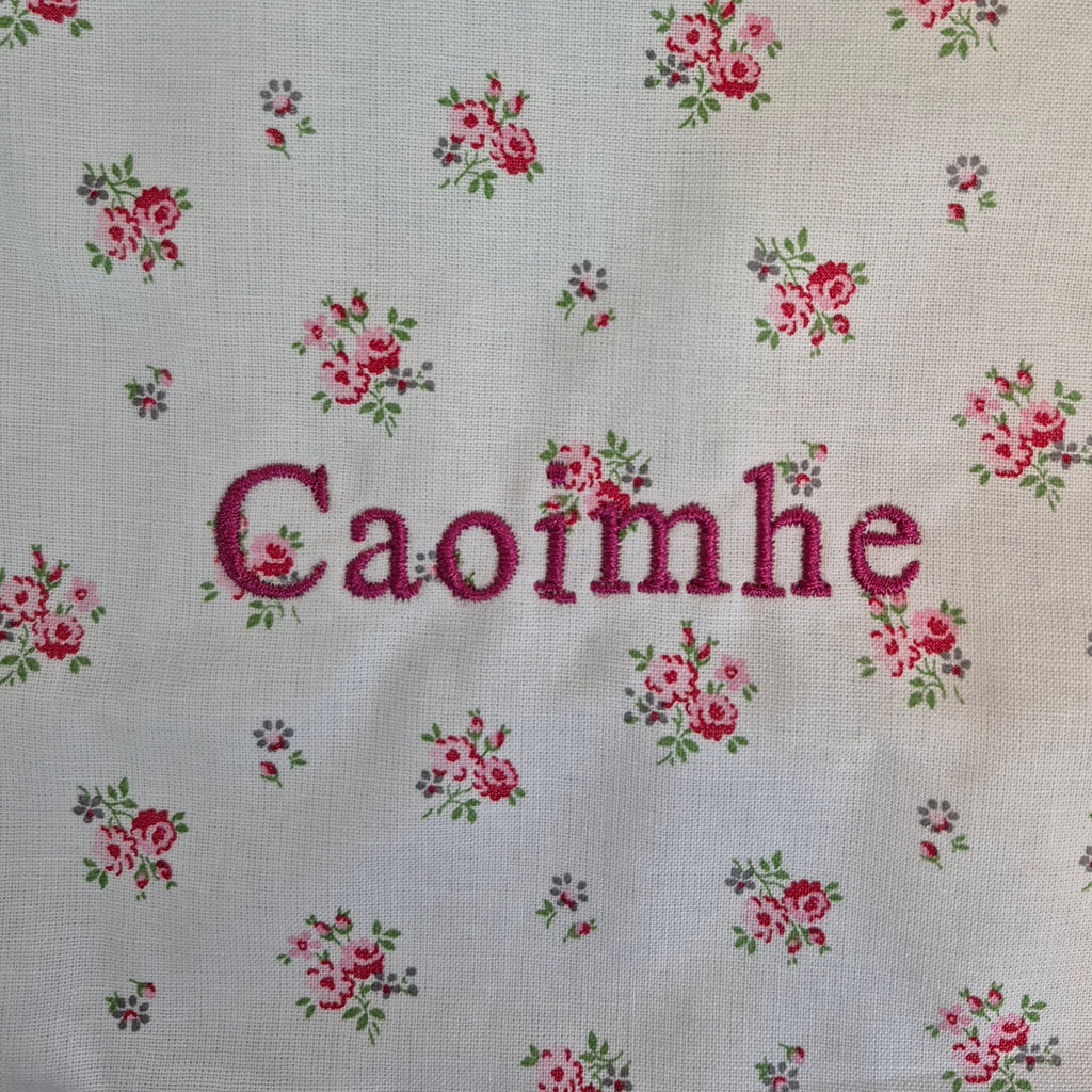 Scalloped  Floral  Bib