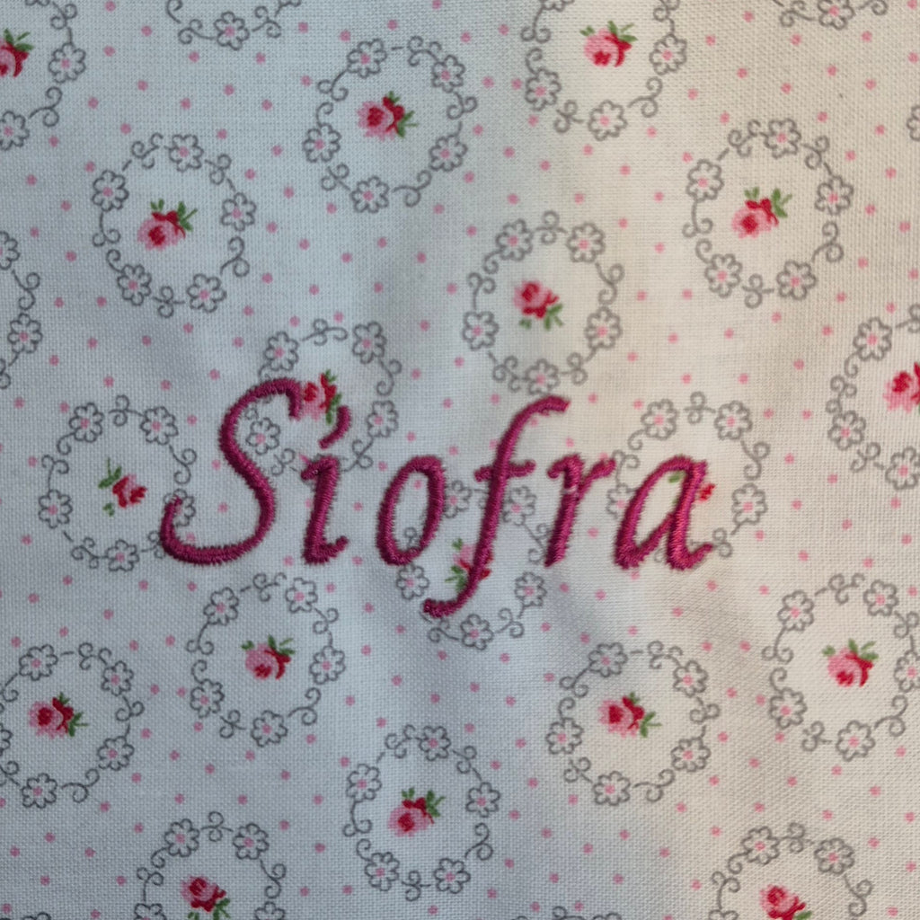 Scalloped  Floral  Bib